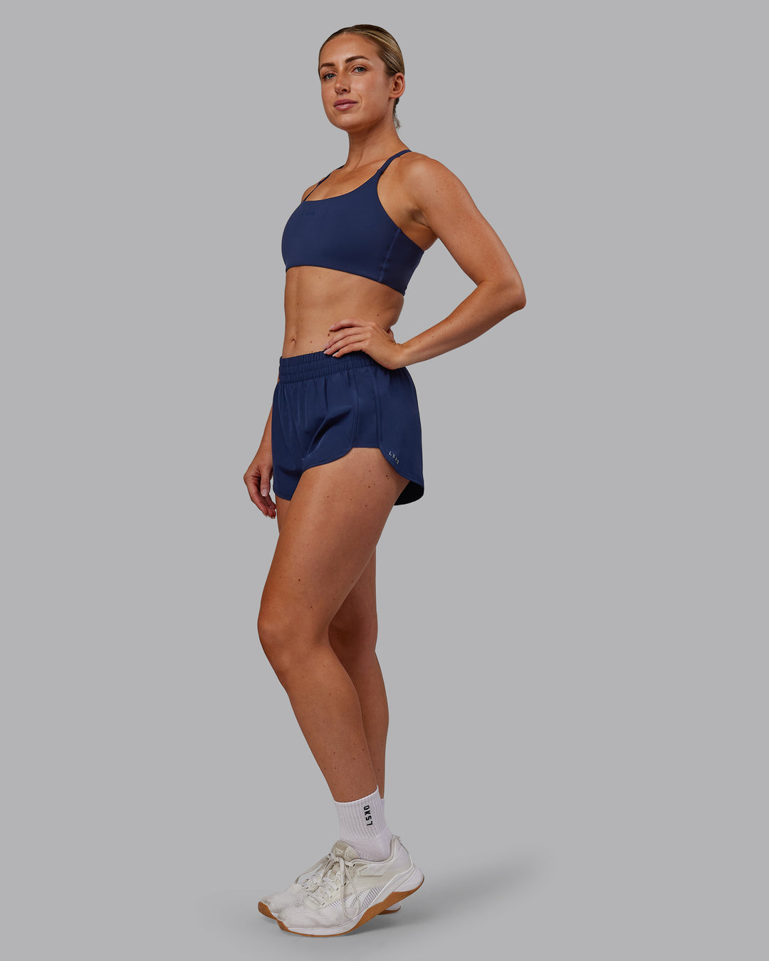 Woman wearing Energy 1.8&quot; Training Short - Future Navy | Model:Paris | Size:S