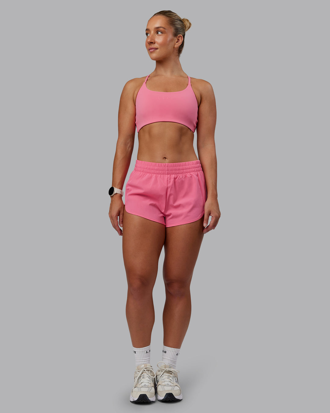 Woman wearing Energy 1.8&quot; Training Short - Pink Lemonade | Model:Lyss | Size:S