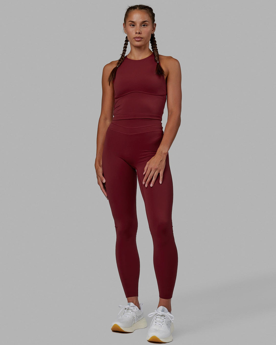 Woman wearing Enhance Full Length Tights - Cranberry