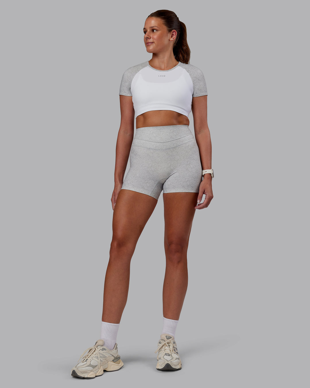 Woman wearing Enhance Ultra High-Rise 4&quot; Short - Grey Marl | Model:Phoebe | Size:S