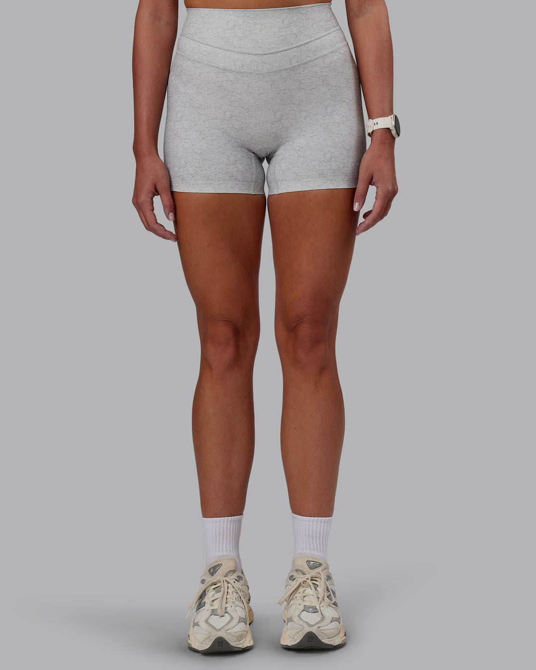 Woman wearing Enhance Ultra High-Rise 4&quot; Short - Grey Marl | Model:Phoebe | Size:S