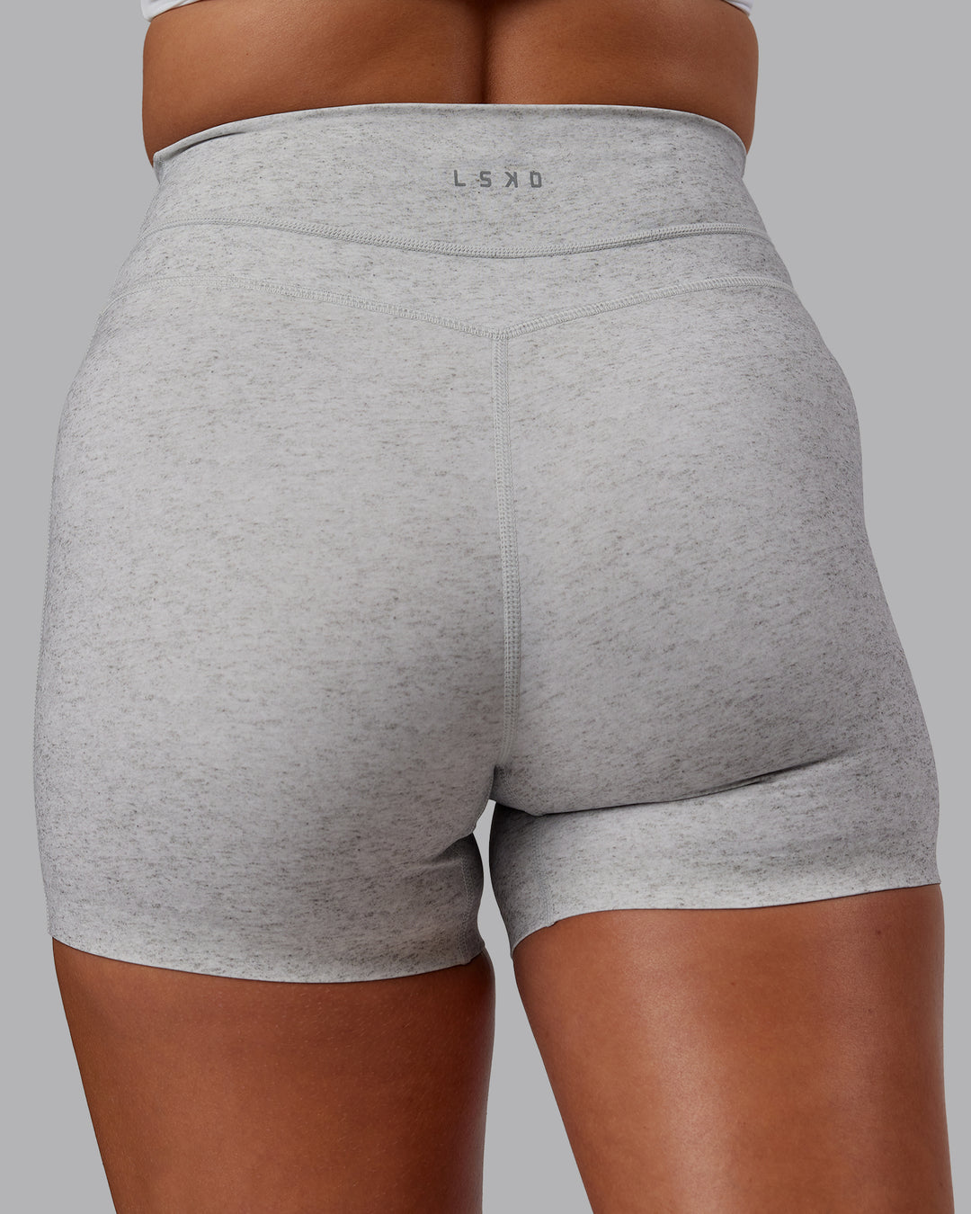 Woman wearing Enhance Ultra High-Rise 4&quot; Short - Grey Marl | Model:Phoebe | Size:S