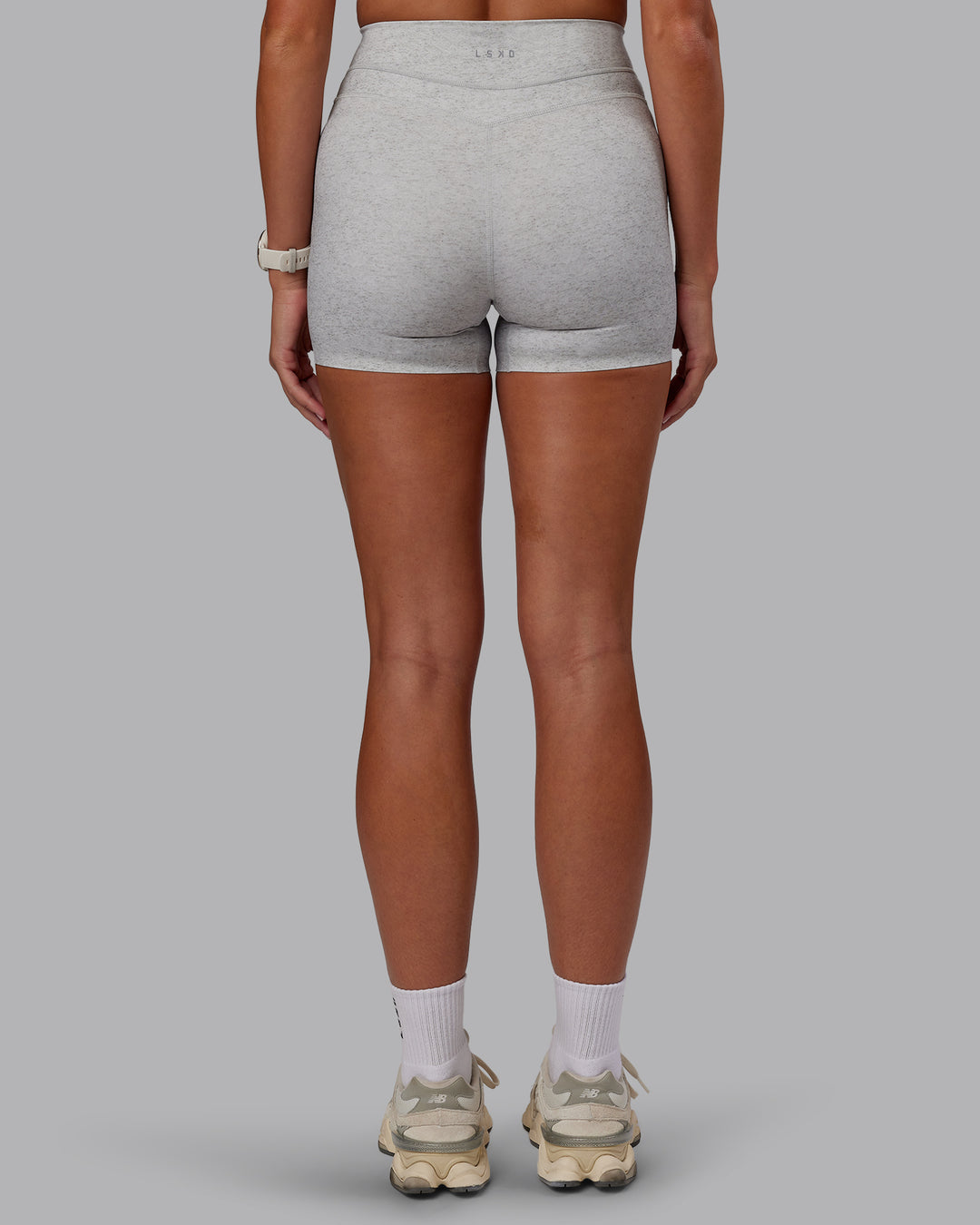 Woman wearing Enhance Ultra High-Rise 4&quot; Short - Grey Marl | Model:Phoebe | Size:S