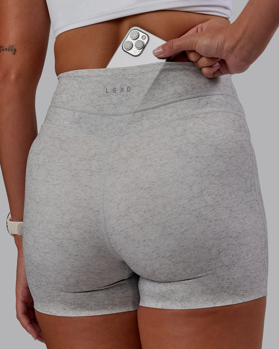 Woman wearing Enhance Ultra High-Rise 4&quot; Short - Grey Marl | Model:Phoebe | Size:S