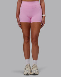 Woman wearing Enhance Ultra High-Rise 4" Short - Pink Frosting | Model:Phoebe | Size:S
