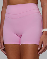 Woman wearing Enhance Ultra High-Rise 4" Short - Pink Frosting | Model:Phoebe | Size:S