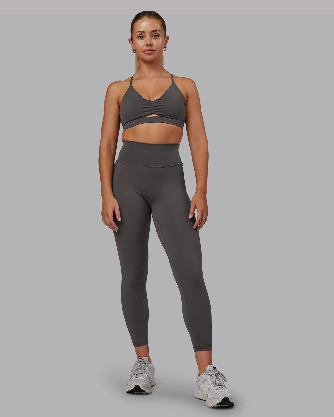 Woman wearing Essence Sports Bra - Dark Storm | Model:Hannah | Size:S