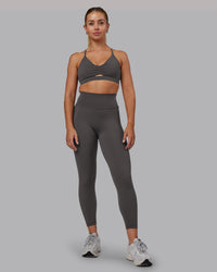 Woman wearing Essence Sports Bra - Dark Storm | Model:Hannah | Size:S