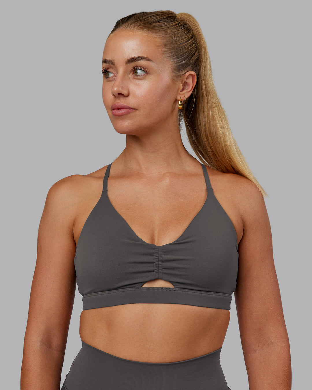 Woman wearing Essence Sports Bra - Dark Storm | Model:Hannah | Size:S