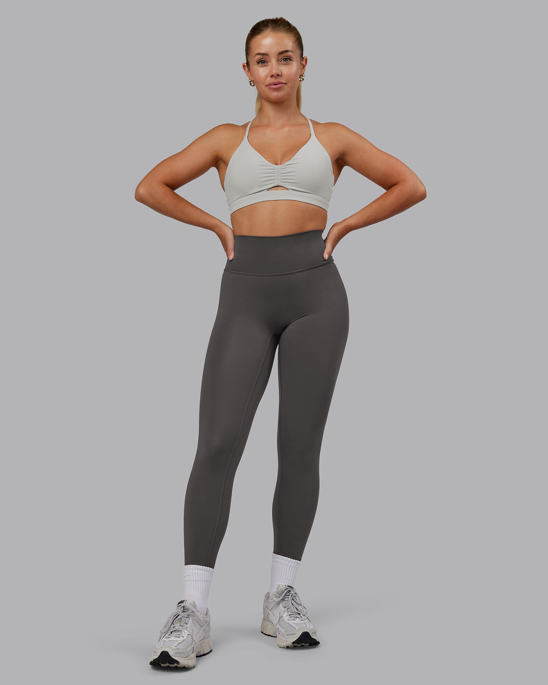 Woman wearing Essence Sports Bra - Shale Beige | Model:Hannah | Size:S