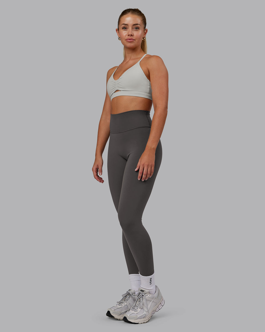 Woman wearing Essence Sports Bra - Shale Beige | Model:Hannah | Size:S
