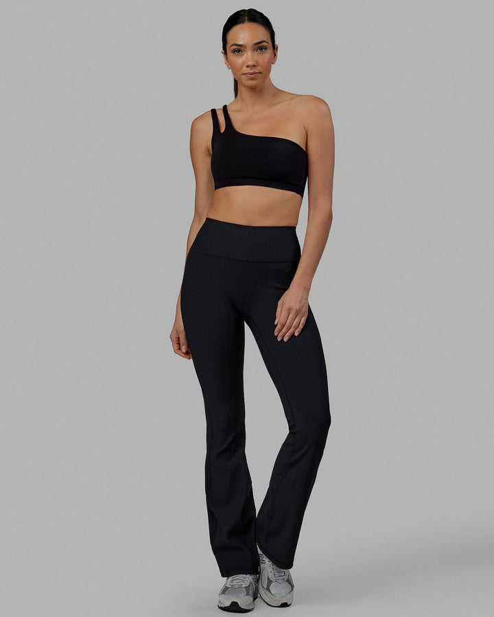 Woman wearing Everyday Ribbed Flare Tight - Black