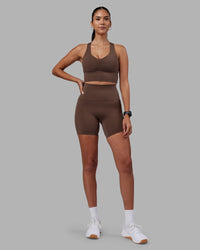 Woman wearing Evoke Longline Sports Bra - Chocolate Martini | Model:Rhiley | Size:S