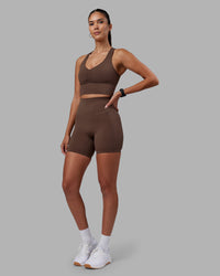 Woman wearing Evoke Longline Sports Bra - Chocolate Martini | Model:Rhiley | Size:S
