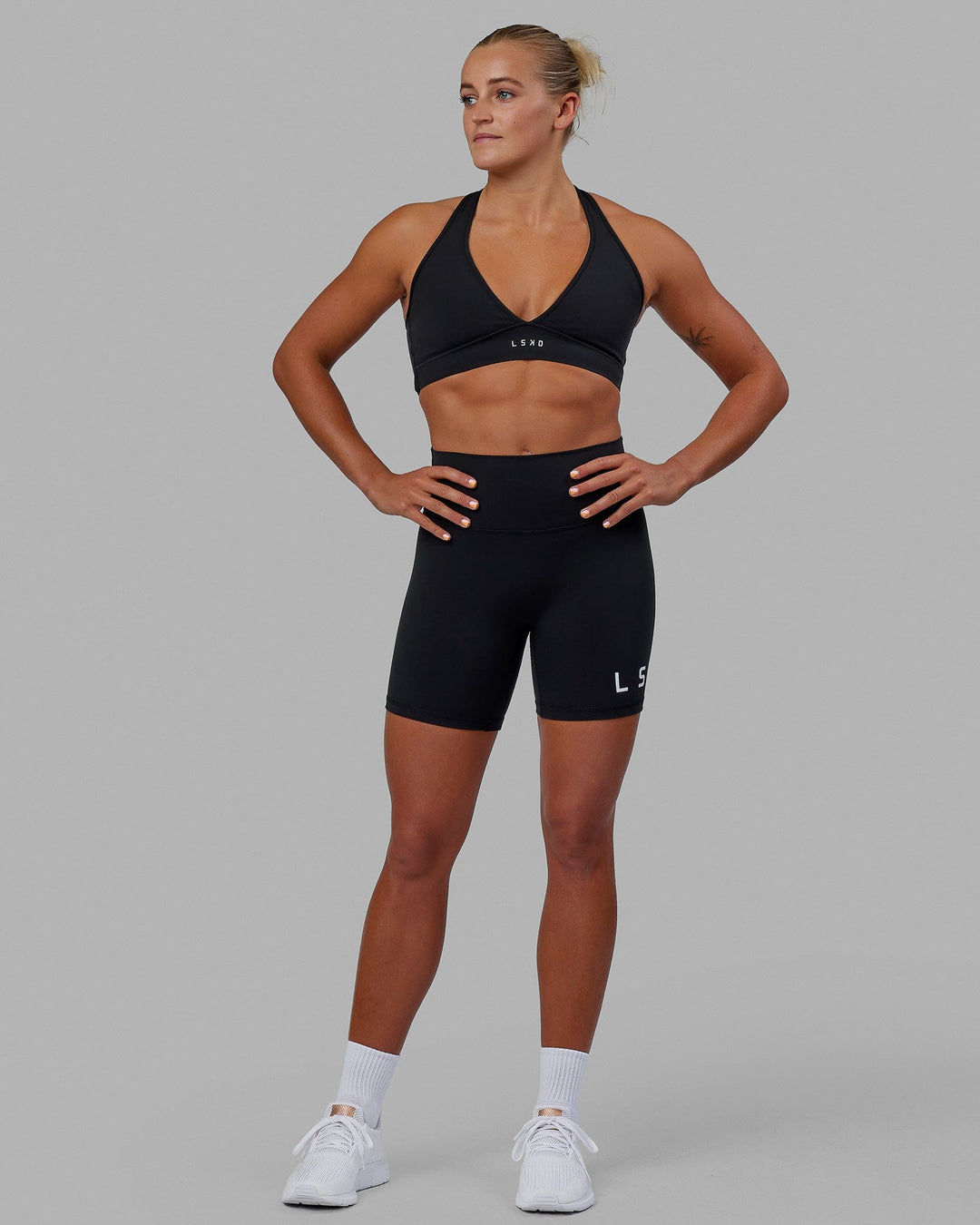 Woman wearing Evolved Mid Short Tight - Black-White