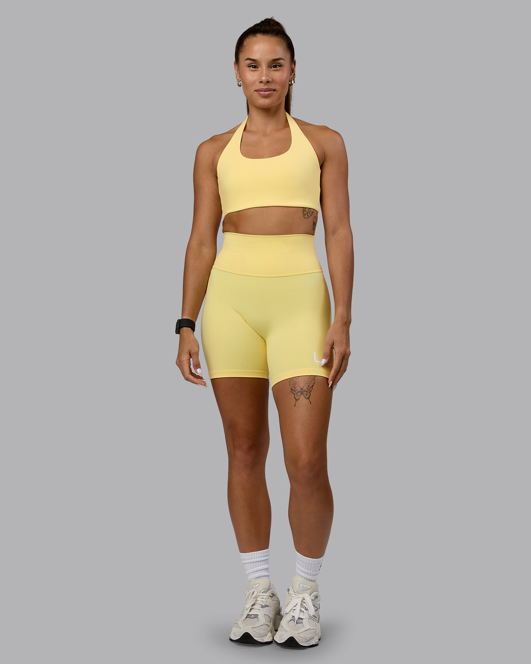 Woman wearing Evolved Ultra High-Rise 6&quot; Short - Lemon-White
