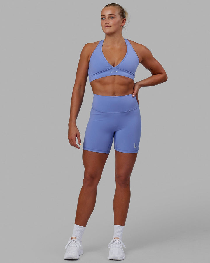 Woman wearing Evolved Mid Short Tight - Cornflower