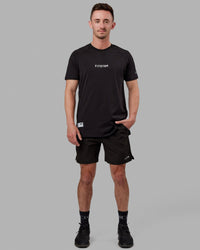 Man wearing Fitstop Optimal Tee - Black