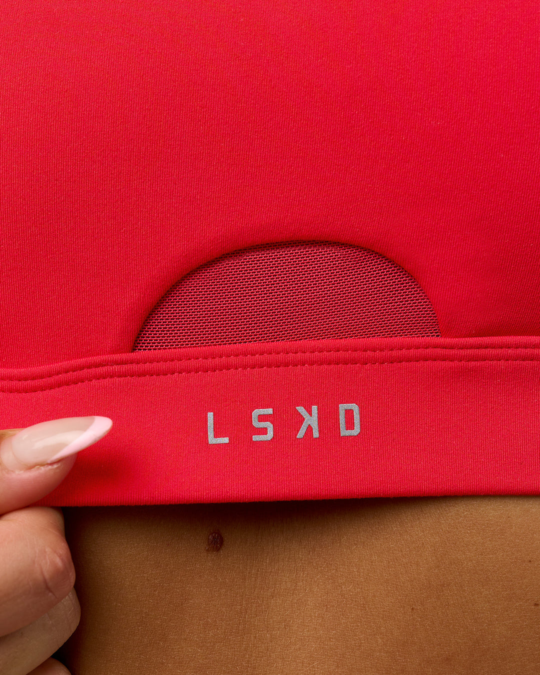 Woman wearing Fast Track Sports Bra Scarlet | Model:Rosie | Size:S |