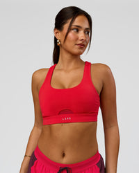Woman wearing Fast Track Sports Bra Scarlet | Model:Bianca | Size:S |