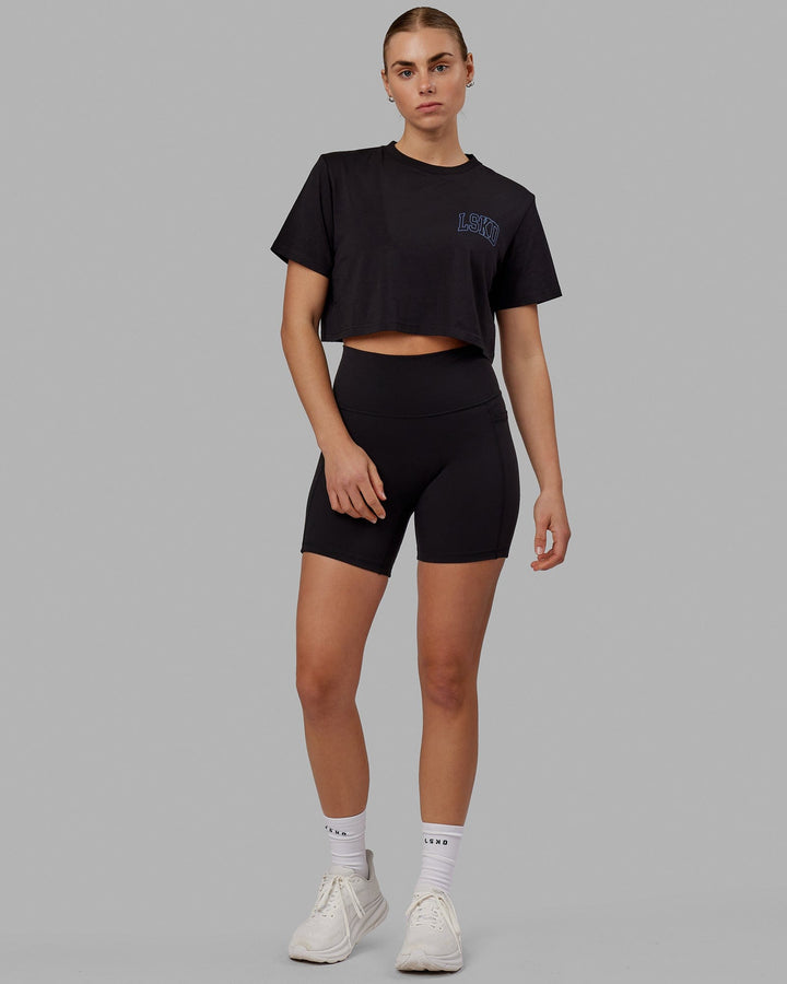 Woman wearing Finish Line Cropped Tee - Black-Power Cobalt