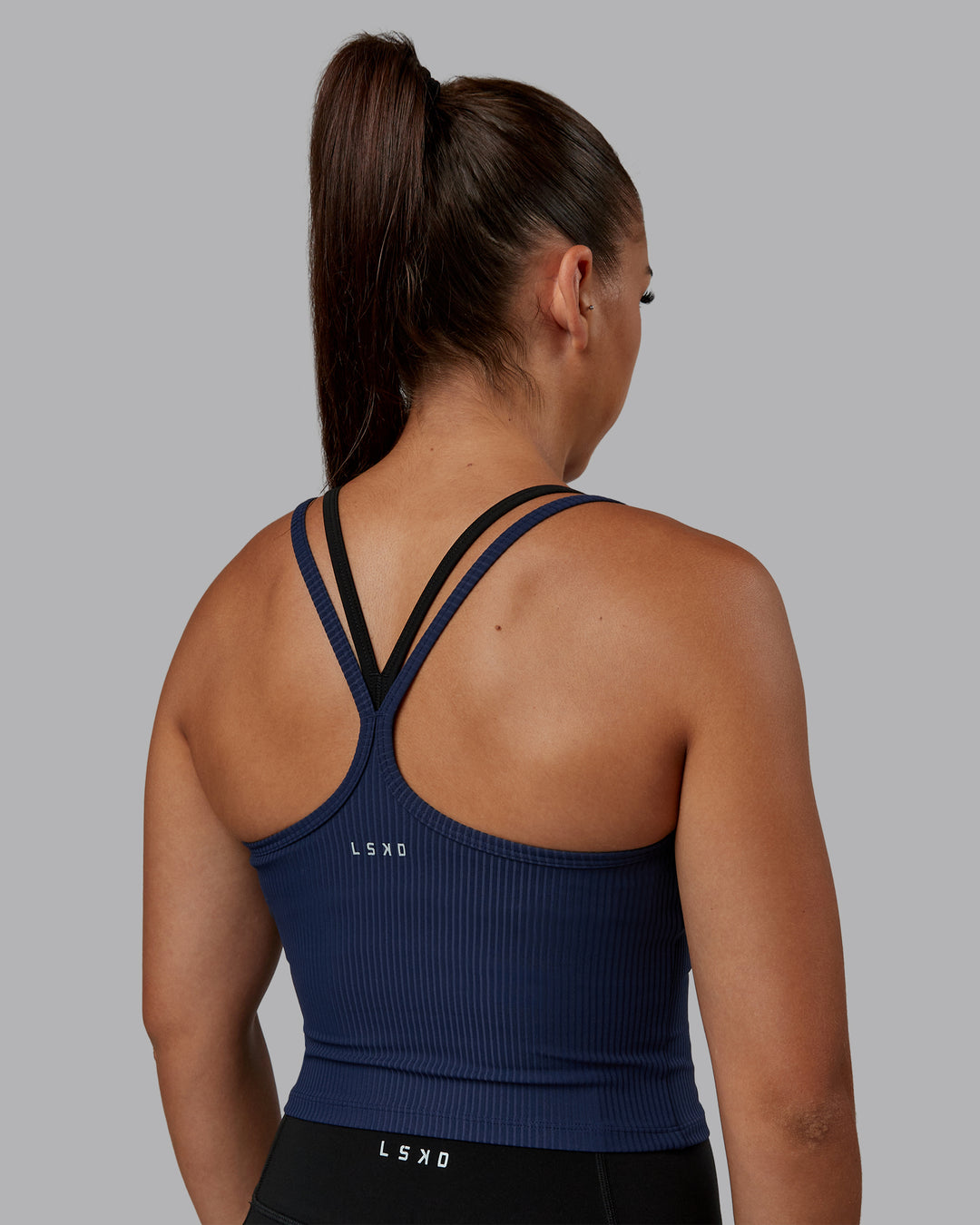 Woman wearing Flame Ribbed Tank in Future Navy | Size:S | Model:Tylah