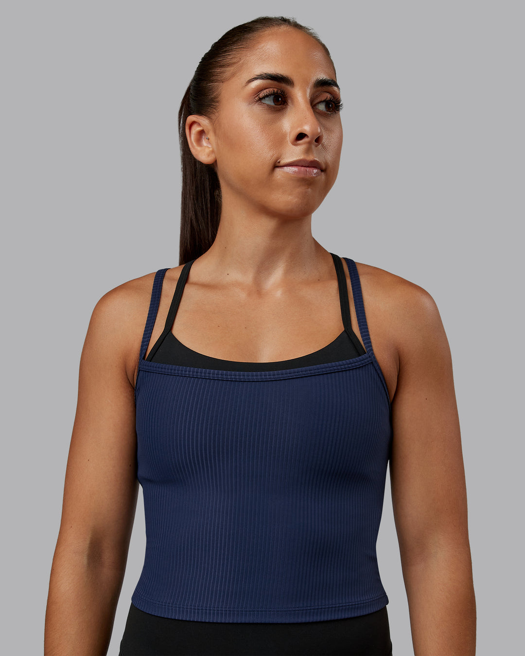 Woman wearing Flame Ribbed Tank in Future Navy | Size:S | Model:Tylah