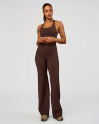 Woman wearing Flow Bonded Scoop Neck Sports Bra - Hot Chocolate | Model:Rosie | Size:S