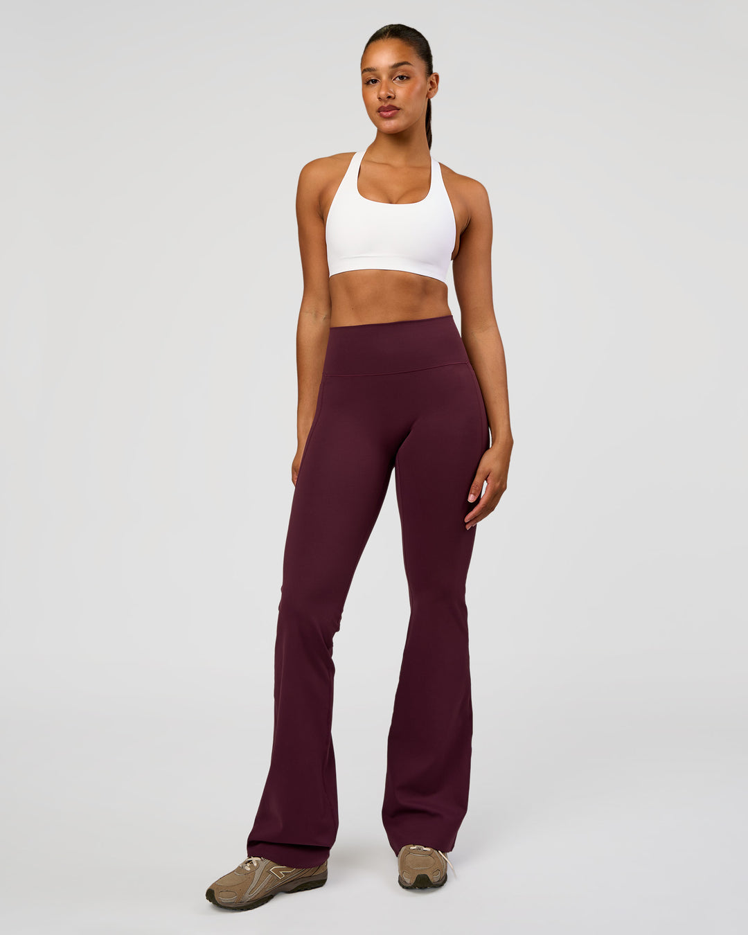 Woman wearing Flow Bonded Scoop Neck Sports Bra - White | Model:Rosie | Size:S