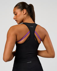 Woman wearing Flow Graphic Performance Tank 2.0 - Black-Radiate | Model:Rosie | Size:S | Thumbnail Index: 2