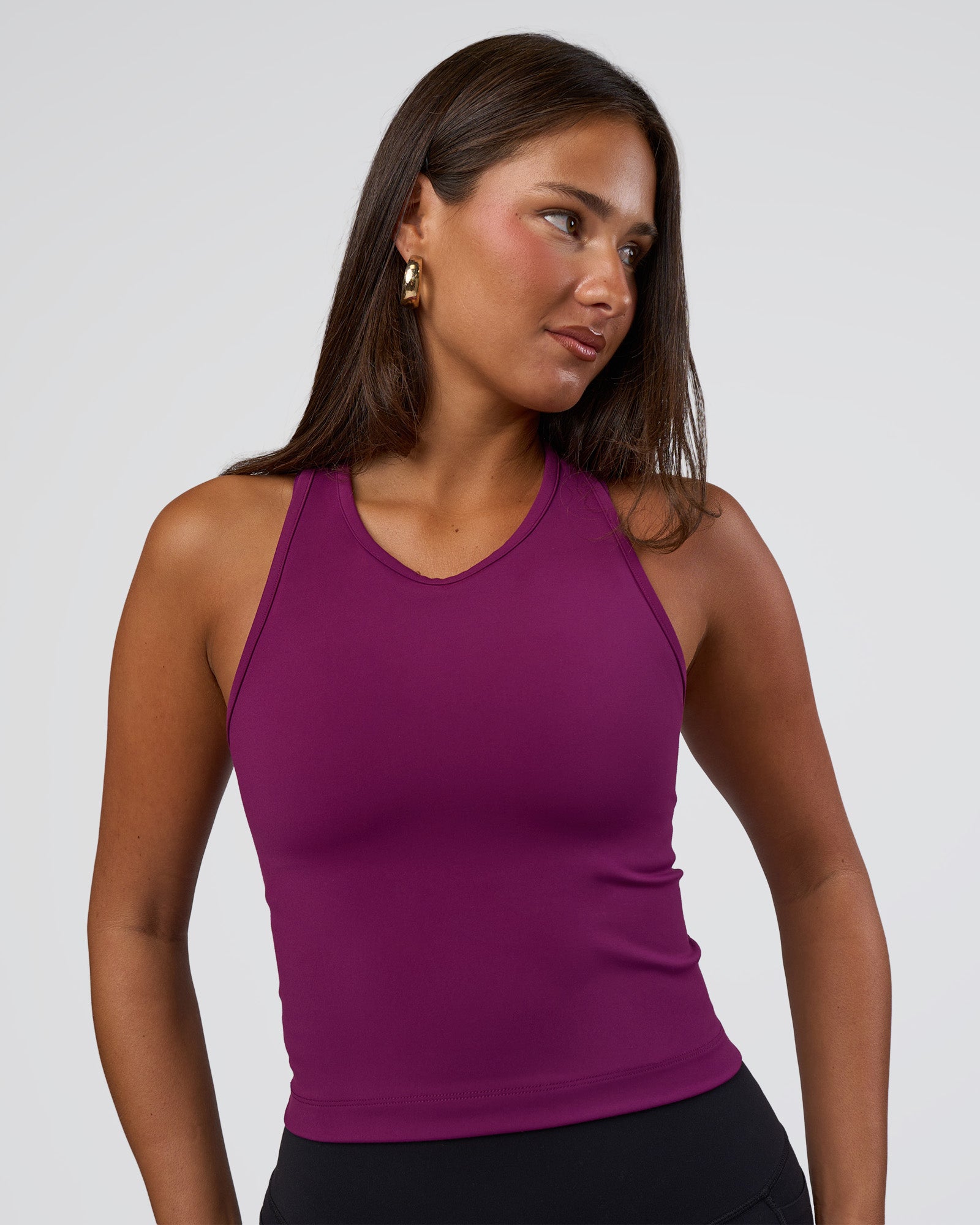 Woman wearing Flow Performance Tank 2.0 - Plum Caspia | Model:Bianca | Size:S