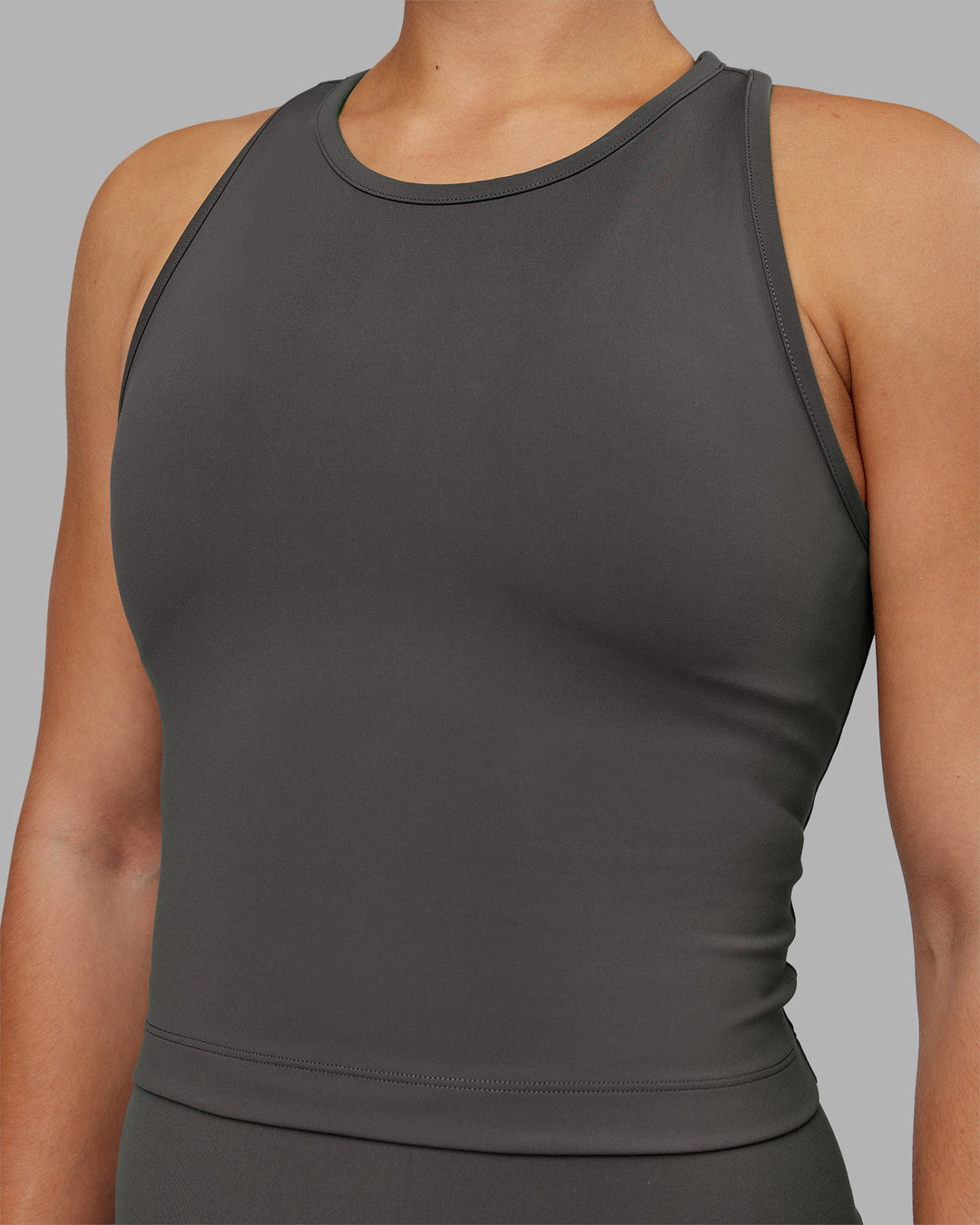 Woman wearing Flow Performance Tank 2.0 - Dark Storm | Model:Keisha | Size:S