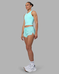 Woman wearing Flow Performance Tank 2.0 - Island Paradise | Model:Sophie | Size:S