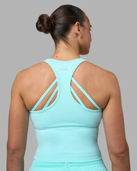 Woman wearing Flow Performance Tank 2.0 - Island Paradise | Model:Sophie | Size:S