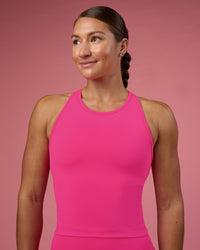 Woman wearing Flow Performance Tank 2.0 - Ultra Pink | Model:Hannah | Size:S