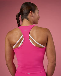 Woman wearing Flow Performance Tank 2.0 - Ultra Pink | Model:Hannah | Size:S