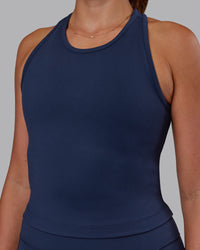 Woman wearing Flow Performance Tank - Future Navy | Model:Phoebe | Size:S