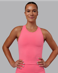 Woman wearing Flow Performance Tank - Pink Lemonade | Model:Charlize | Size:S