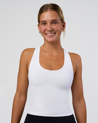 Woman wearing Flow Scoop Neck Performance Tank - White | Model:Amity | Size:S