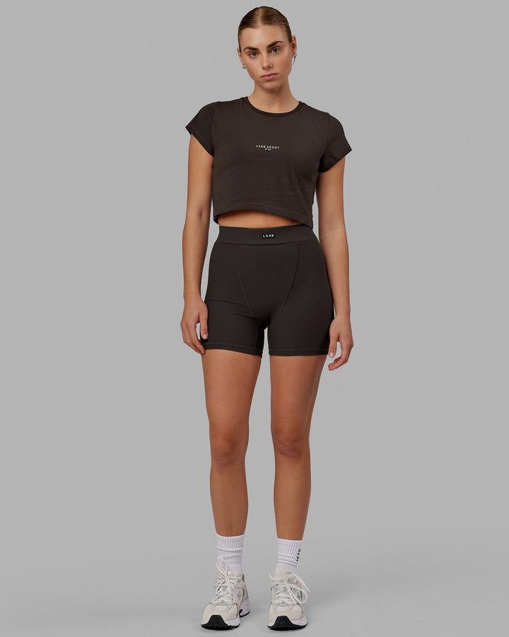 Woman wearing Front Runner Baby Tee - Dark Walnut