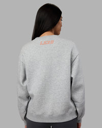 Woman wearing Full Form Fleece Sweater with Side Slits - Marl Grey | Model:Rhiley | Size:S