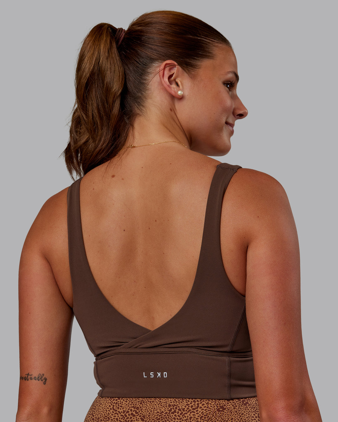 Woman wearing Longline Sports Bra - Chocolate Martini | Model:Phoebe | Size:S