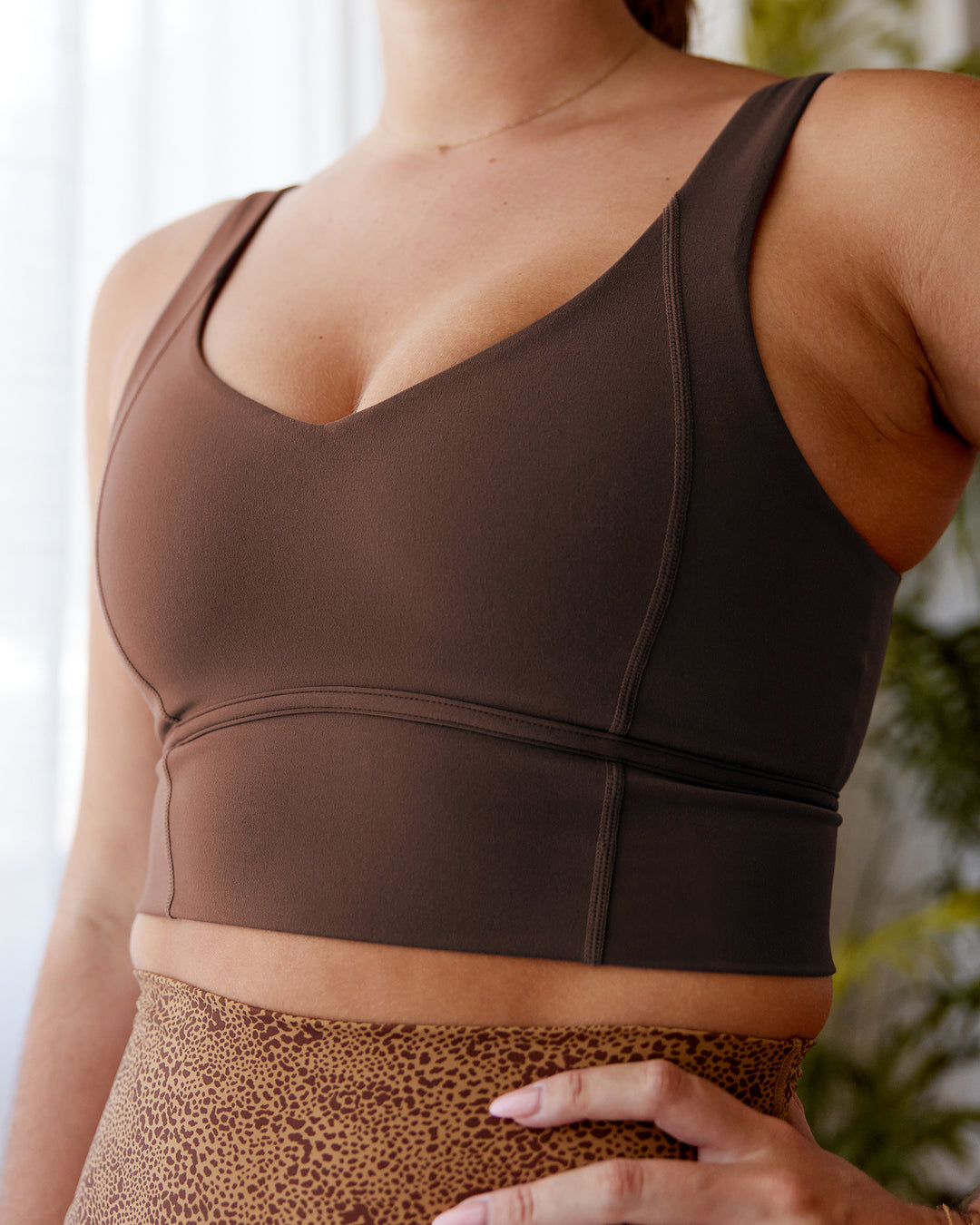 Woman wearing Longline Sports Bra - Chocolate Martini | Model:Chantelle | Size:
