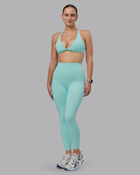 Woman wearing Fusion Ultra High-Rise 7/8 Legging - Island Paradise | Model:Lillie | Size:S