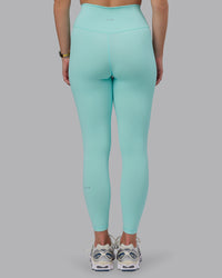Woman wearing Fusion Ultra High-Rise 7/8 Legging - Island Paradise | Model:Lillie | Size:S