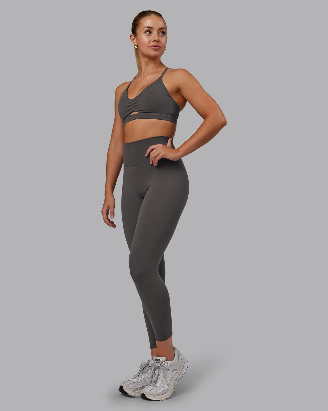 Woman wearing Fusion Ultra High-Rise 7/8 Legging - Dark Storm | Model:Hannah | Size:S