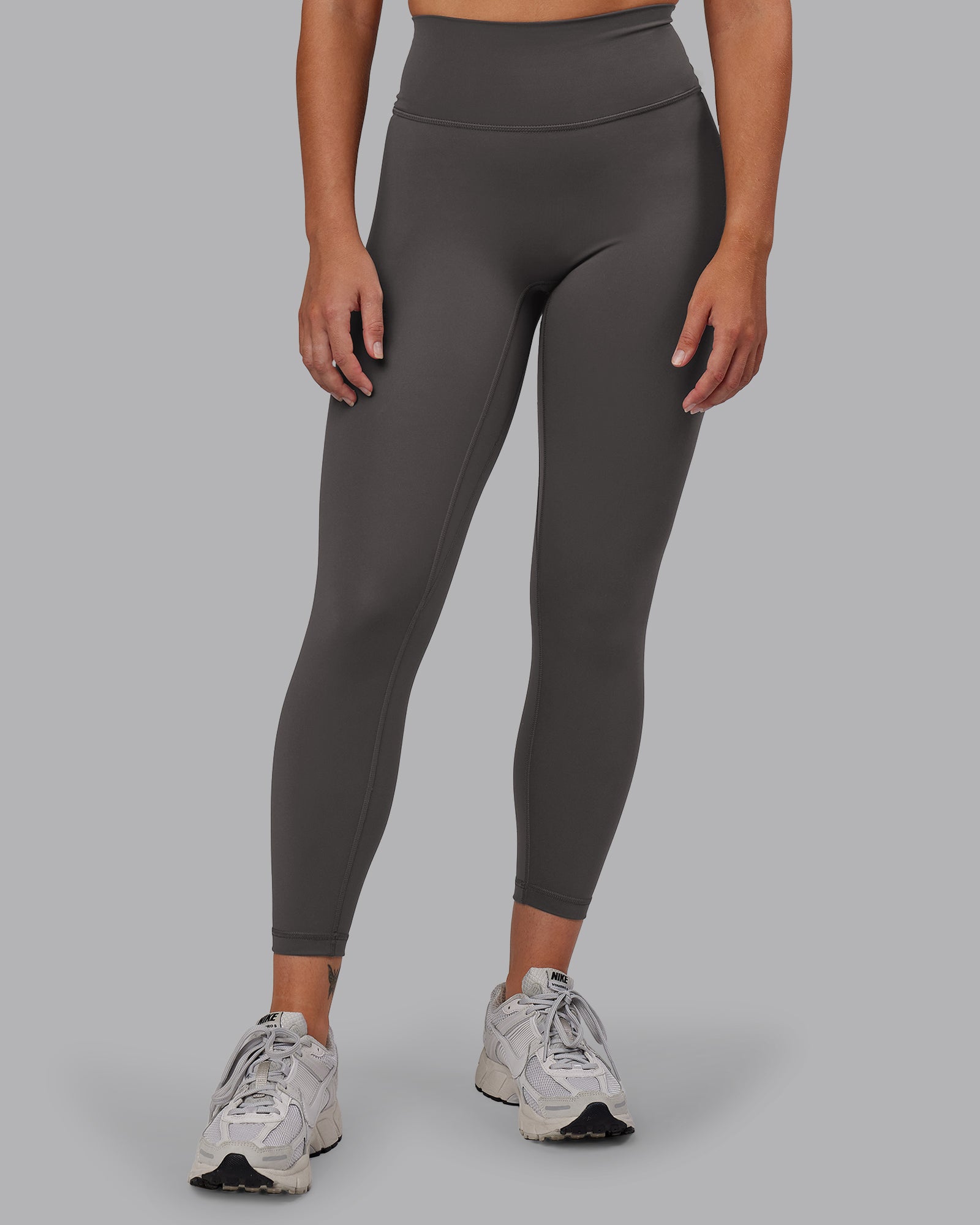 Woman wearing Fusion Ultra High-Rise 7/8 Legging - Dark Storm | Model:Hannah | Size:S