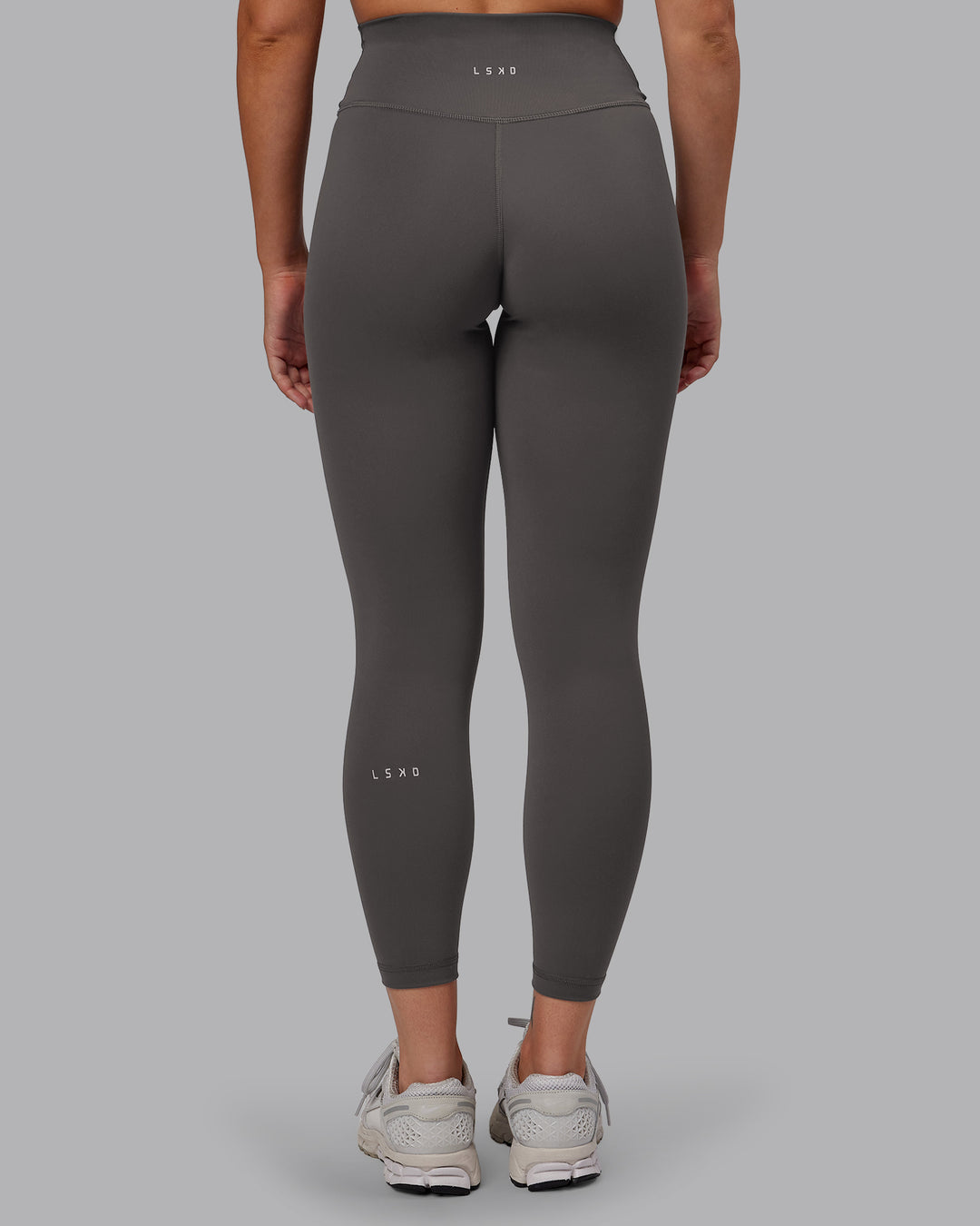 Woman wearing Fusion Ultra High-Rise 7/8 Legging - Dark Storm | Model:Hannah | Size:S
