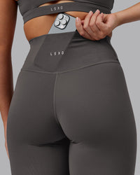 Woman wearing Fusion Ultra High-Rise 7/8 Legging - Dark Storm | Model:Hannah | Size:S