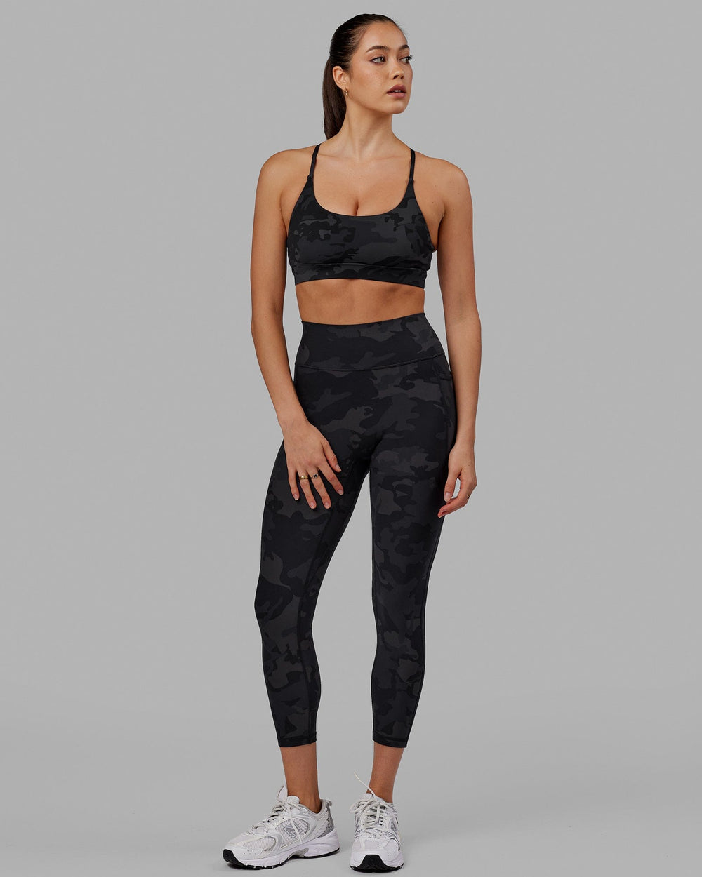 Woman wearing Fusion 7/8 Length Tight - Black-Camo